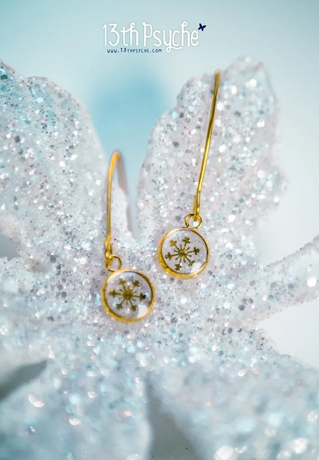 Gold snowflake stainless steel earrings