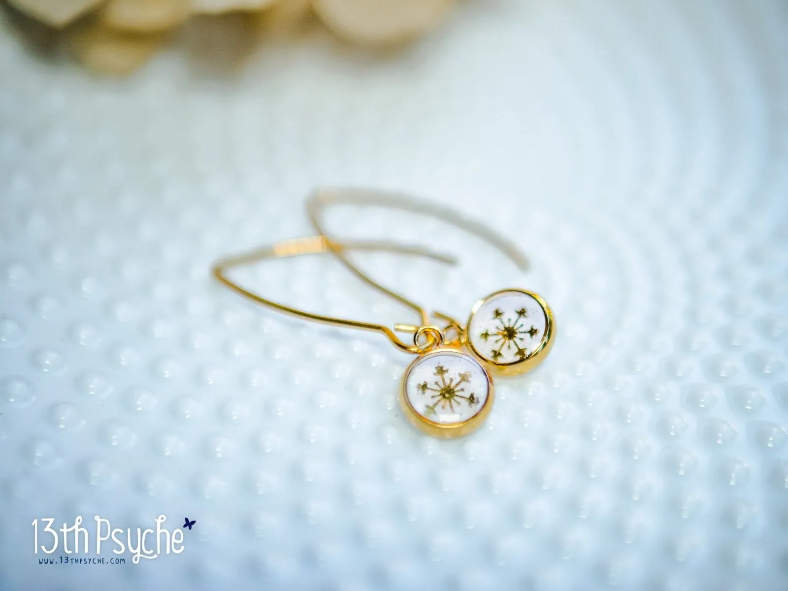 Gold snowflake stainless steel earrings